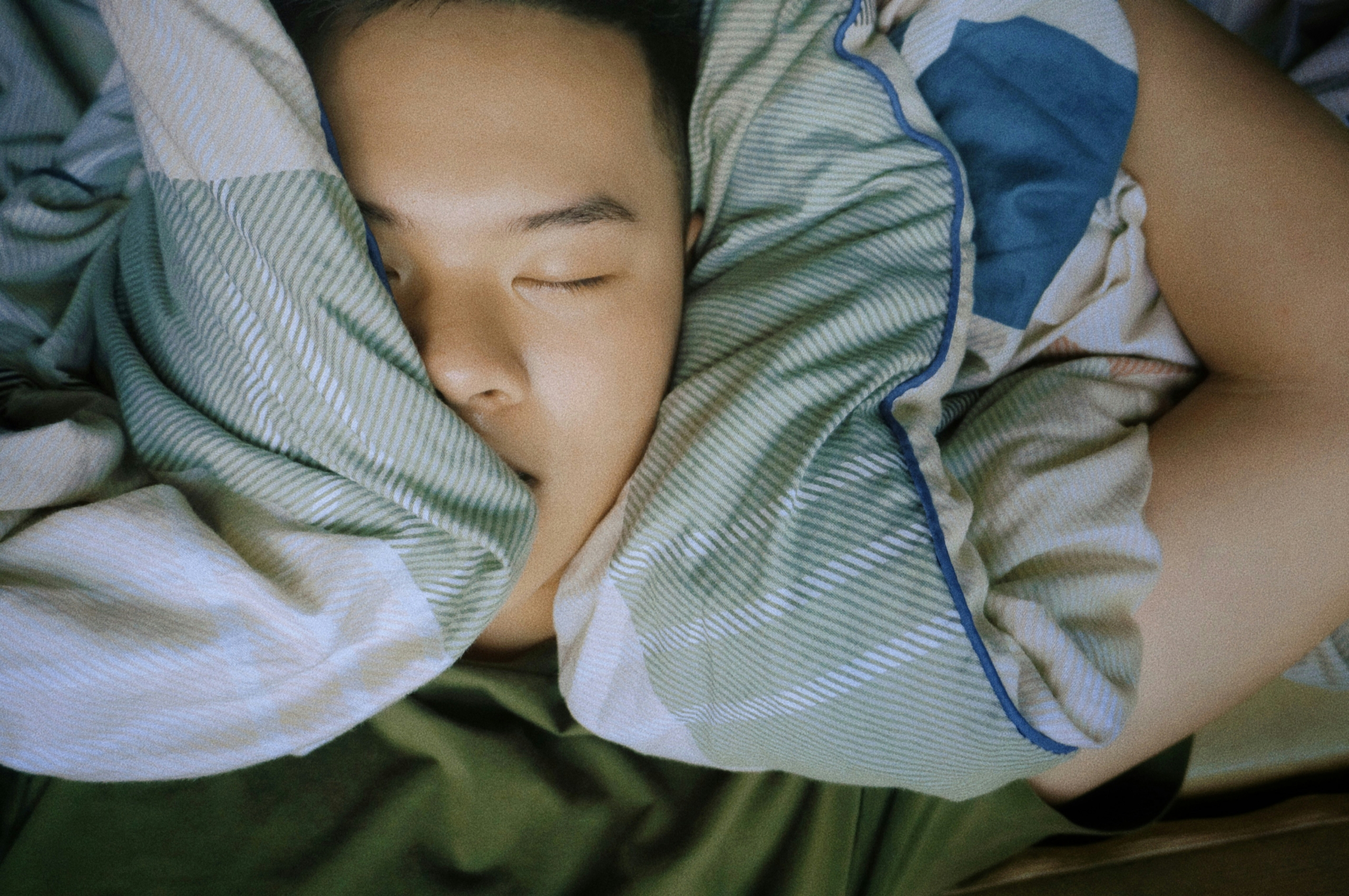 Person sleeping soundly with trusted asthma specialist care in the greater Philadelphia region.